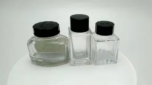 عبوات زجاجية للحبر