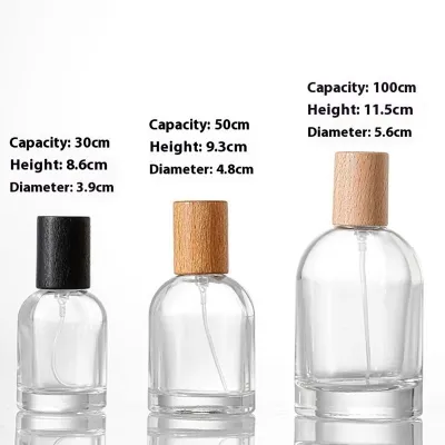 زجاجات عطور زجاجية أسطوانية مع بخاخ رذاذ دقيق (30 مل / 50 مل / 100 مل)